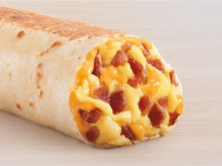 A tortilla wrap filled with bacon, egg, and cheese.