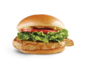 A wendys grilled chicken sandwich with lettuce and tomato.