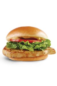 A wendys grilled chicken sandwich with lettuce and tomato.