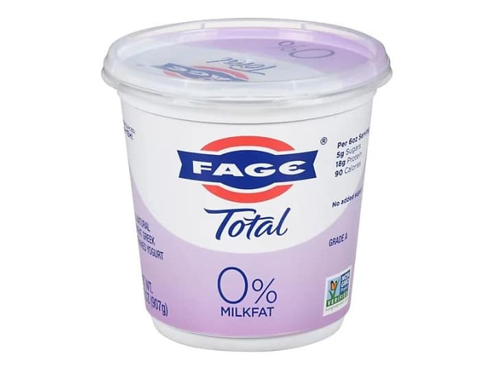 A container of Fage total 0% milkfat Greek yogurt.