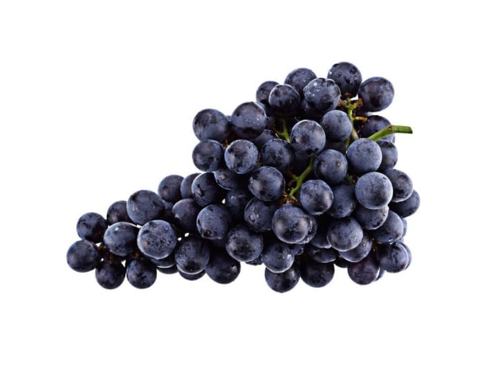 A bunch of purple grapes.