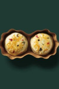 Two Starbucks egg white bites in a container.