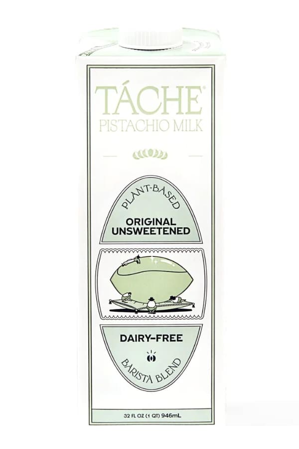 A square thin carton of Táche pistachio milk.