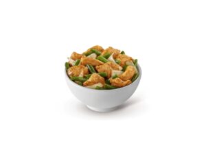 A bowl of panda express string bean chicken breast.