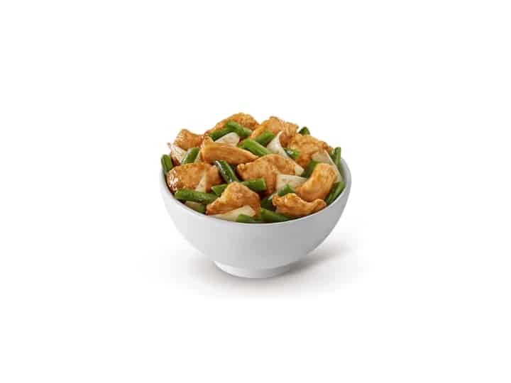 A bowl of panda express string bean chicken breast.