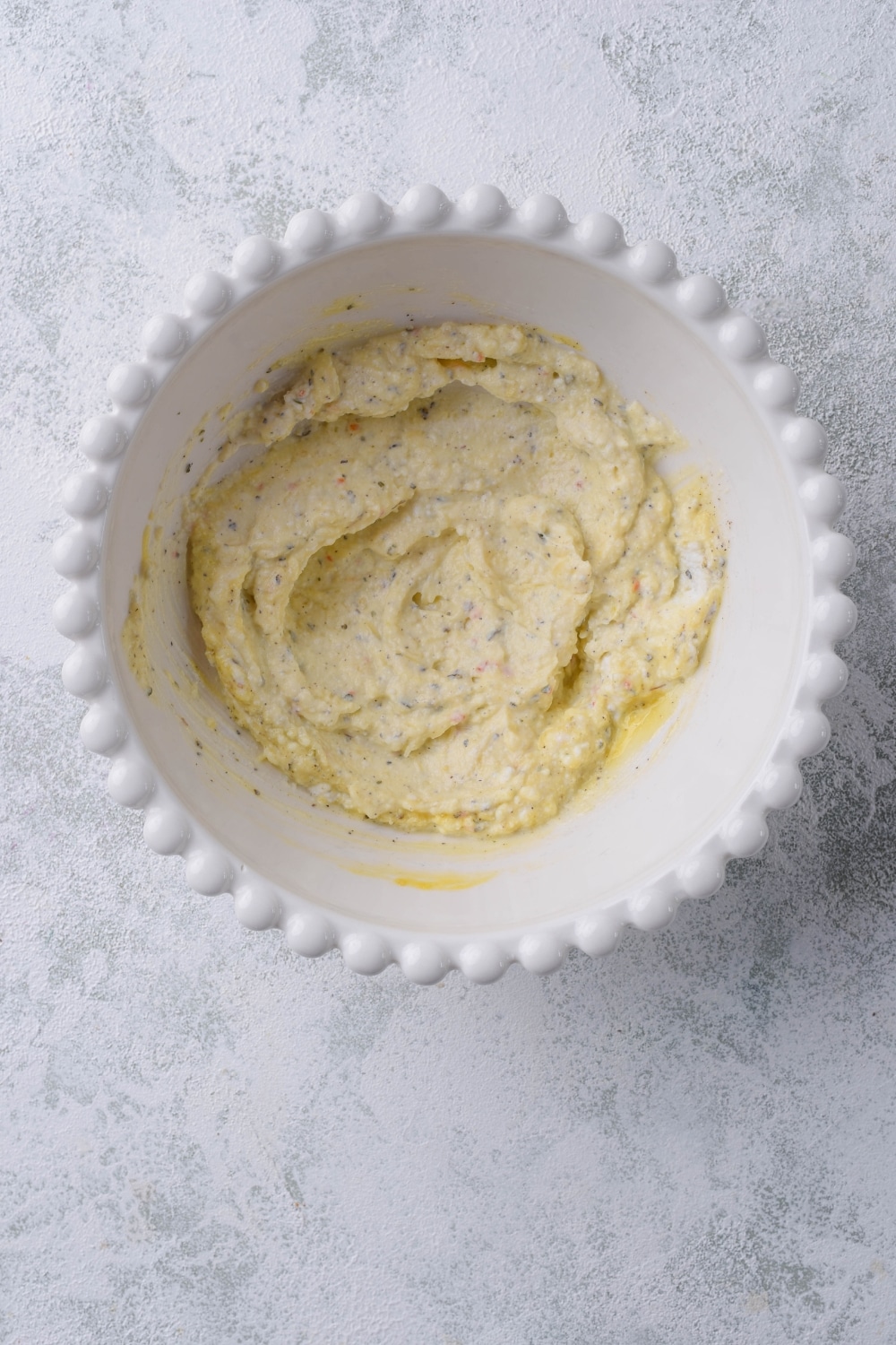 A bowl of eggplant rollatini filling.