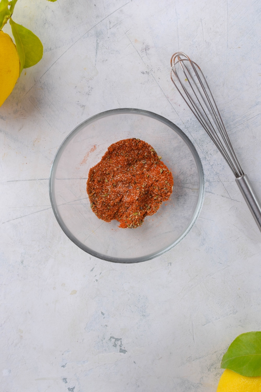 A small glass bowl with mahi mahi seasoning.