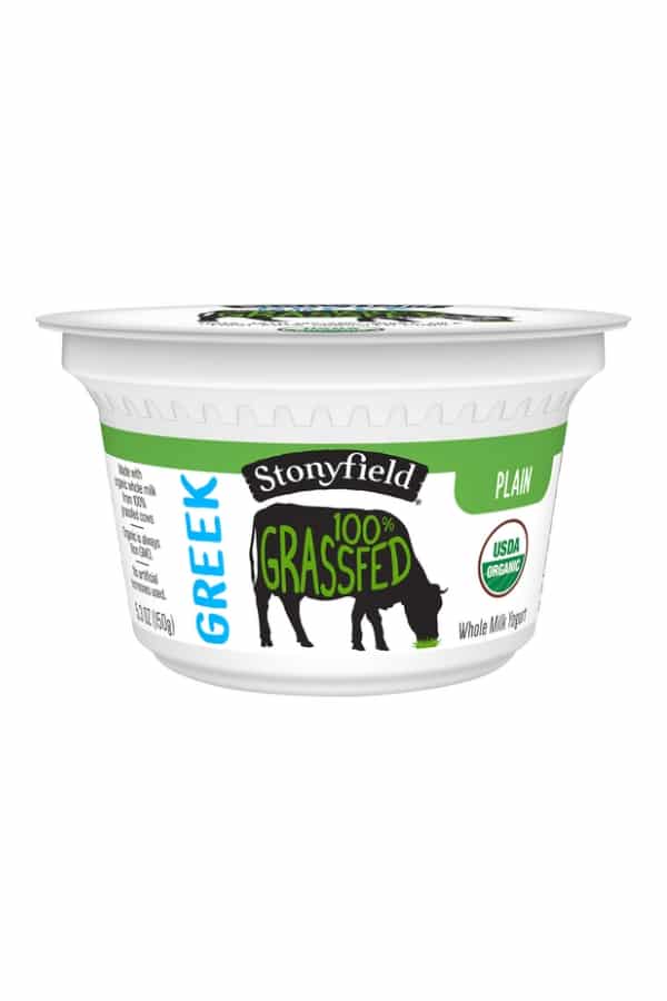 A container of stonyfield 100% grassfed greek yogurt.