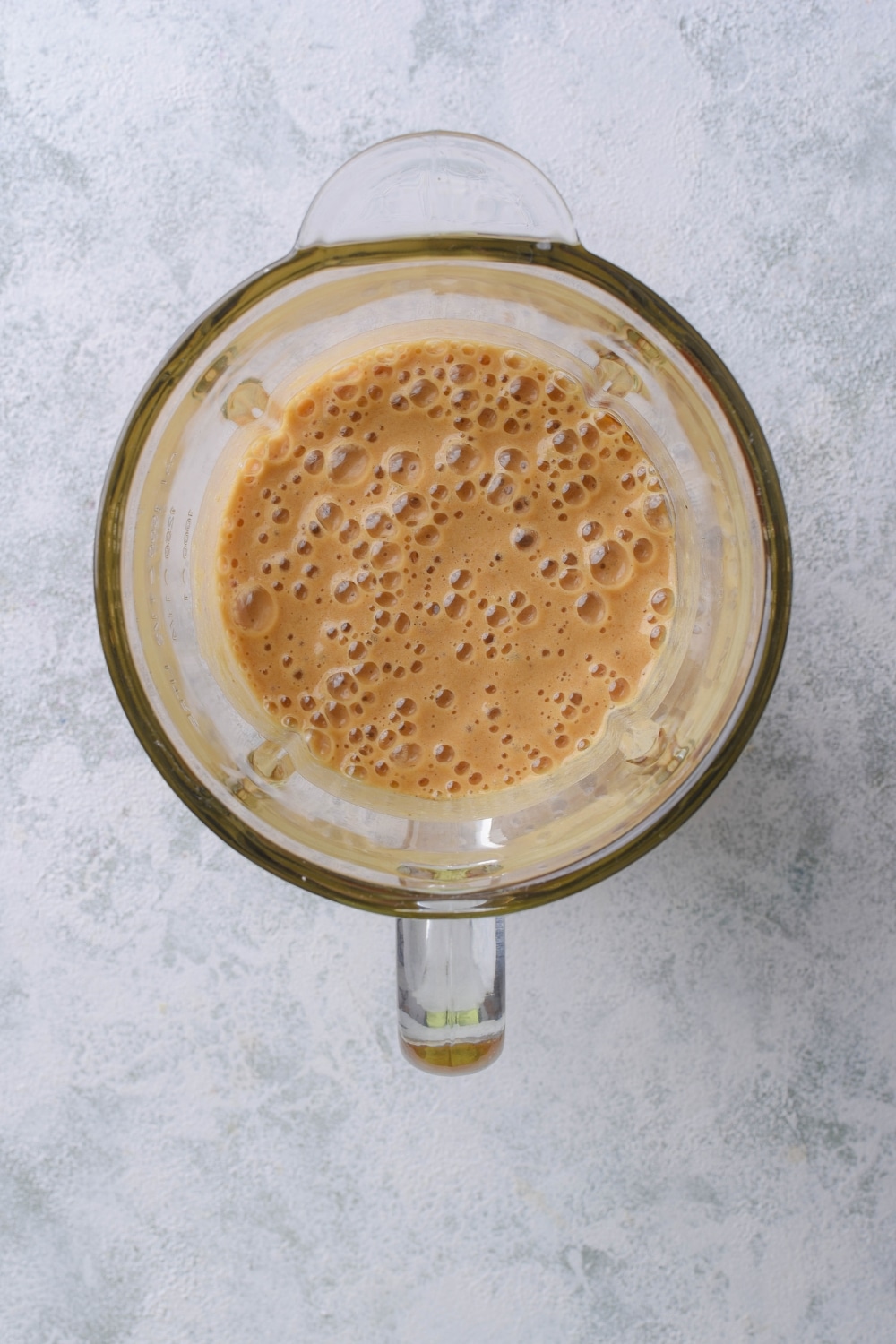 Blended oatmeal banana bread batter in a blender.