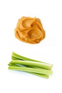 A scoop of peanut butter and a bundle of celery.