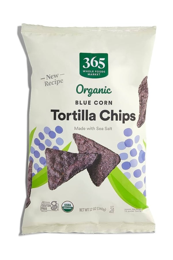 A bag of 365 by Whole Foods Organic Blue Corn Tortilla Chips.