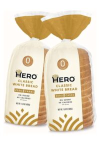 Two bags of Hero Classic White Bread.