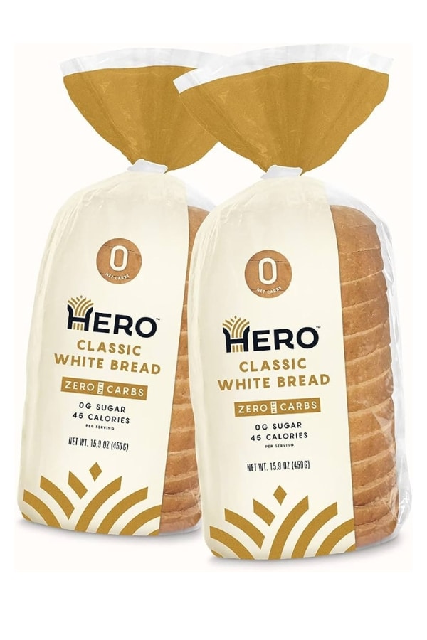 Two bags of Hero Classic White Bread.