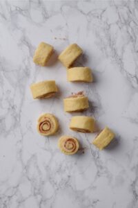 Rolled and sliced protein cinnamon roll dough.