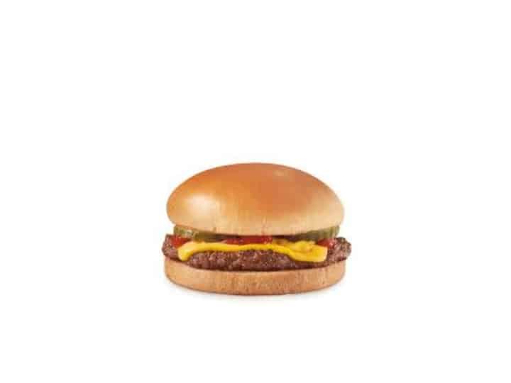 A cheeseburger with ketchup and pickles.