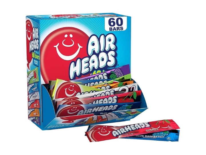 A box of airheads and some airheads in front of it.