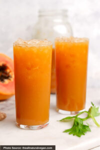Two tall glasses of Gut Healthy Papaya Juice.