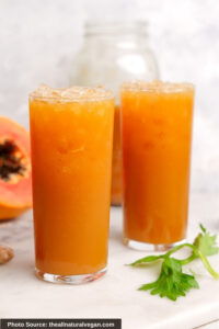Two tall glasses of Gut Healthy Papaya Juice.