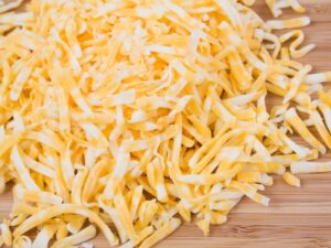 A bunch of shredded monterey jack cheese.