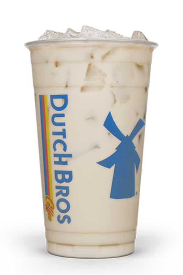 a clear cup of dutch bros almond milk chai latte.