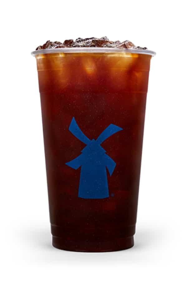 a clear cup of dutch bros americano.