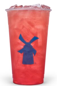 a clear cup of dutch bros strawberry tea.