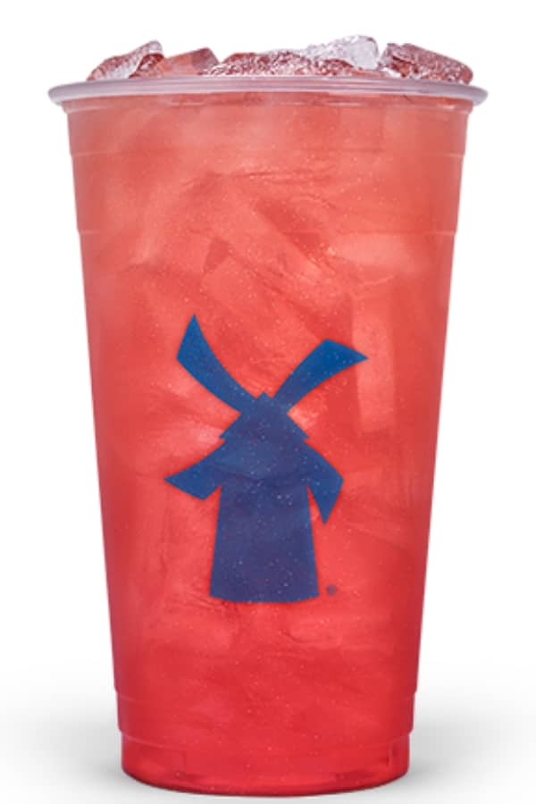 a clear cup of dutch bros strawberry tea.