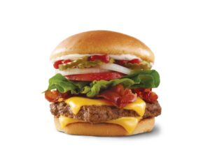 A cheeseburger with bacon, lettuce, onion, tomato, ketchup and mayo.