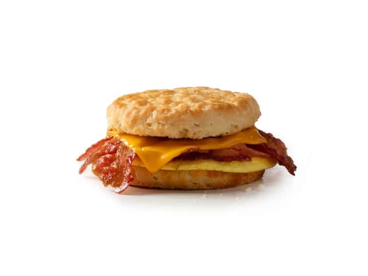 A bacon egg and cheese sandwich on a biscuit.