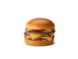 A triple cheeseburger with ketchup, pickles, and mustard.