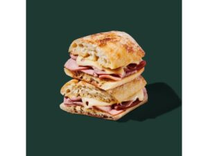 A ham and swiss sandwich on a baguette.