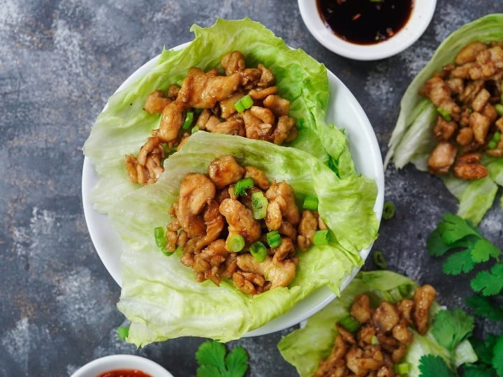 Ground turkey on top of an open lettuce wrap.