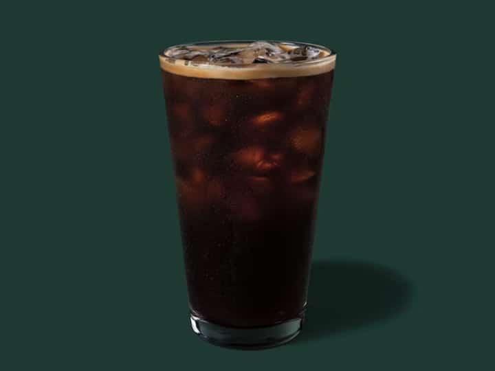 A glass cup of starbucks cold brew coffee.