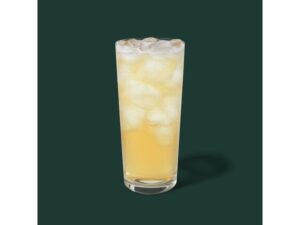 A clear cup of iced green tea.