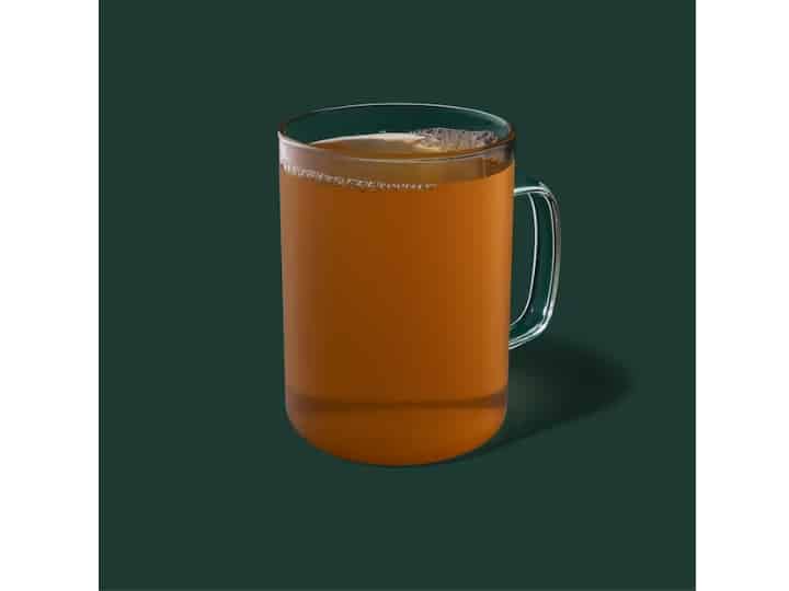 A clear cup of starbucks mint majesty tea.