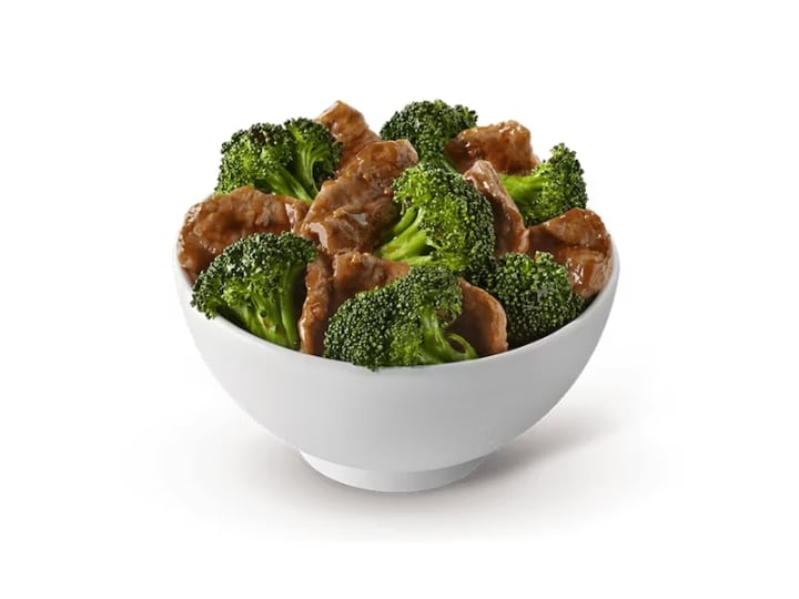 A bowl of broccoli and beef.