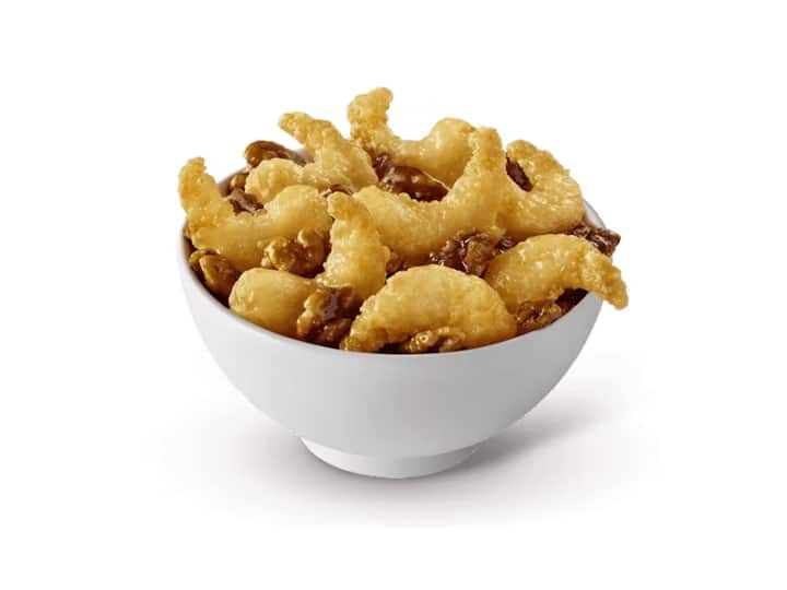 A bowl of honey walnut shrimp.