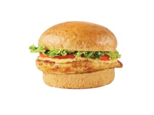 A grilled chicken sandwich with lettuce, tomato, and cheese.