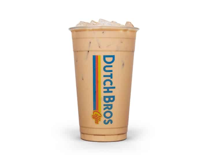 A clear cup of almond milk annhilator from dutch bros.