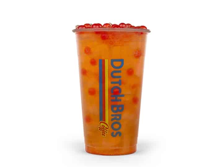 A clear cup of dutch bros sugar rebels tea with boba in it.