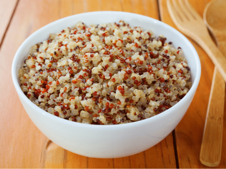 A white bowl filled with quinoa.