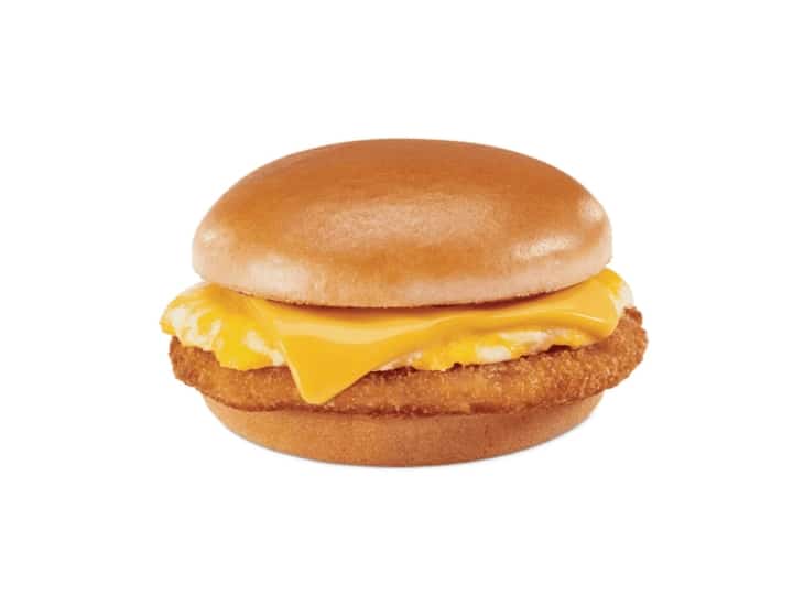 A chicken sandwich with egg and cheese.