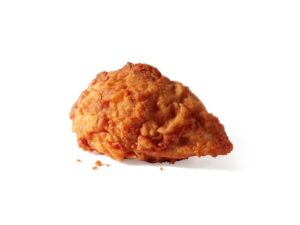 A piece of fried chicken breast.