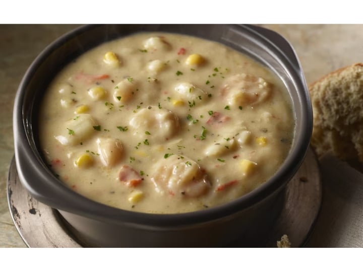 A cup of shrimp and lobster chowder.