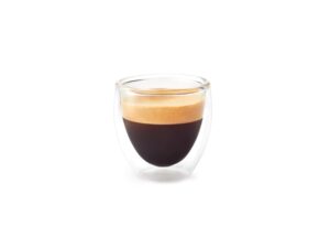 An espresso shot in a glass cup.