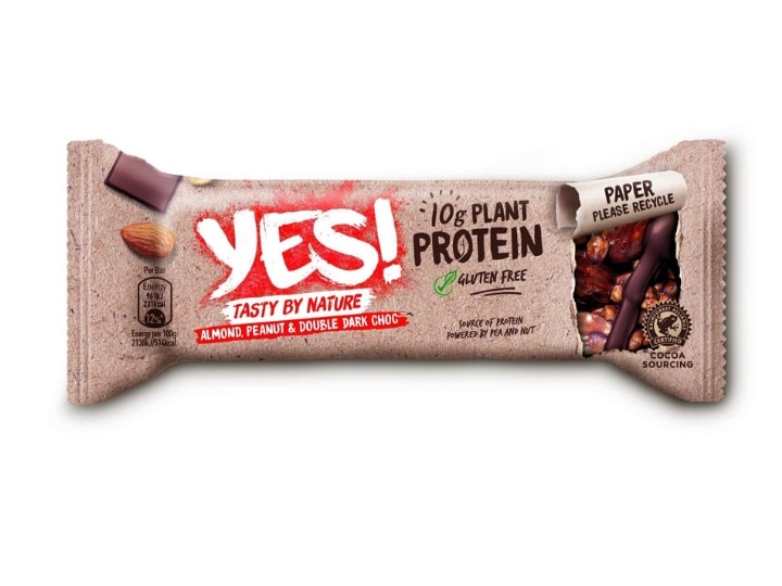 A YES! protein bar inside of its packaging.