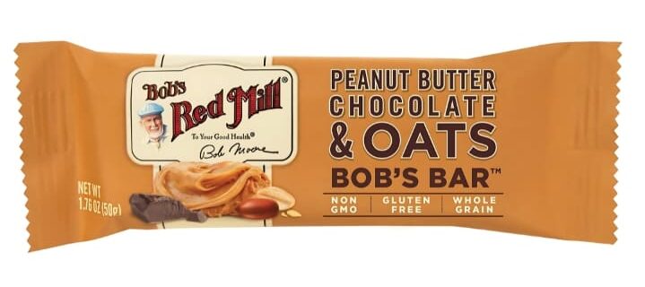 An individual Bob's Red Mill peanut butter chocolate and oats granola bar on a white background.