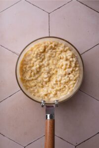 A pot filled with mac and cheese.