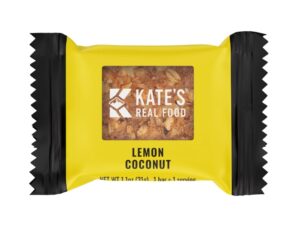 An individual Kate's Real Good lemon coconut granola bar on a white background.