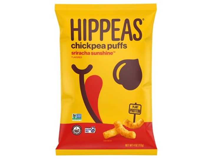 An image of a bag of Hippeas Chickpea Puffs in Sriracha Sunshine on a white background.